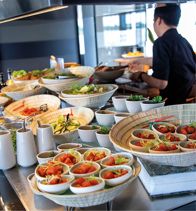 A gourmet selection of Southeast Asian cuisine prepared by an expert chef in cruise ship kitchen