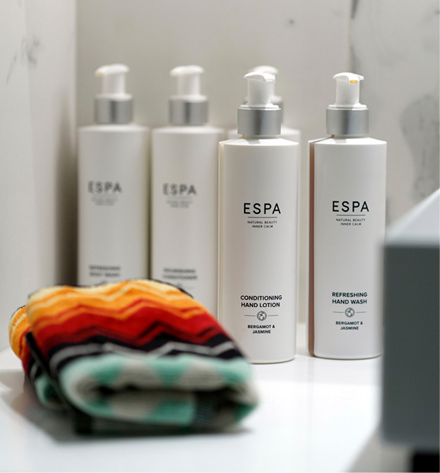 A detailed shot of the luxury ESPA toiletries and Missoni towels available in the cabin bathrooms on board an Emerald Cruises yacht